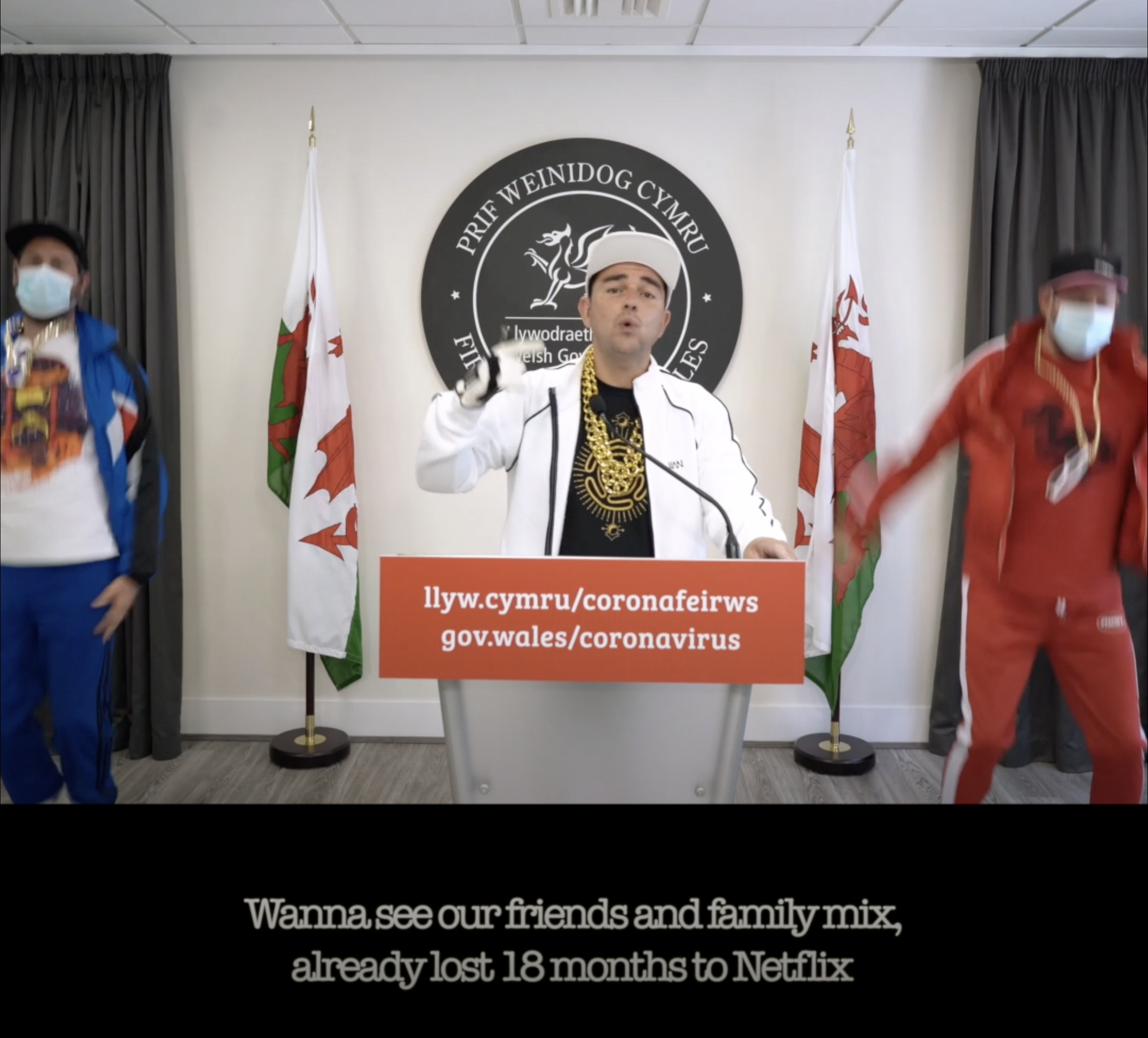 Three men in music video for goldie lookin chain,