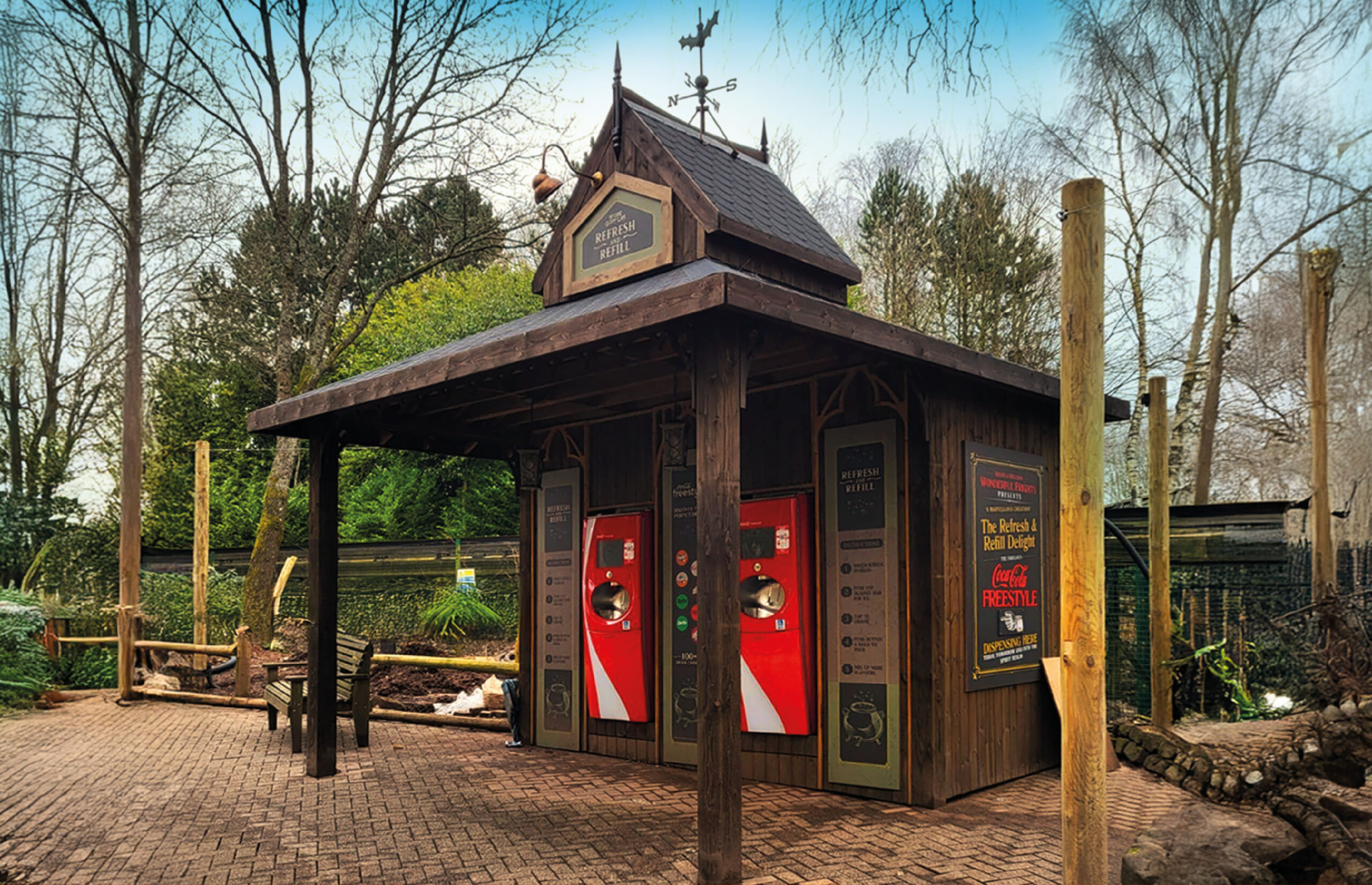 Freestanding drink dispensers set into wooden spooky house