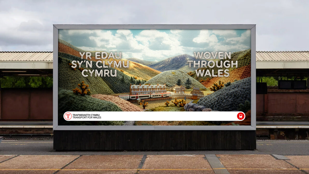 Transport for Wales out-of-home advertising showcasing the Woven through Wales brand platform at a railway station.